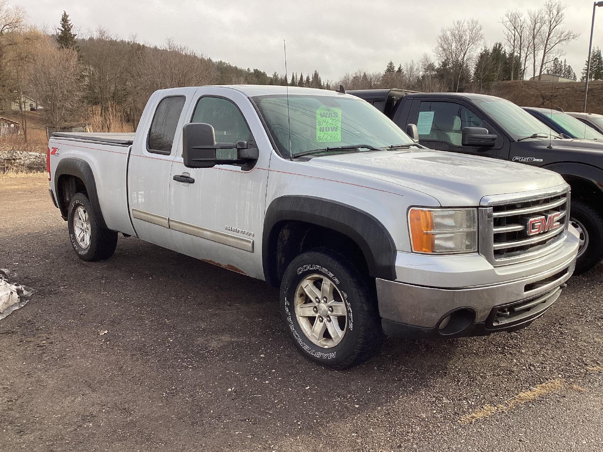 2013 GMC Sierra 1500 SLE in Quicksilver Metallic — front three-quarter view